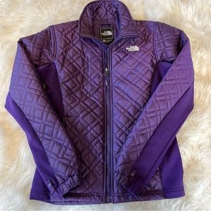 The north face, purple quilted jacket, size extra small